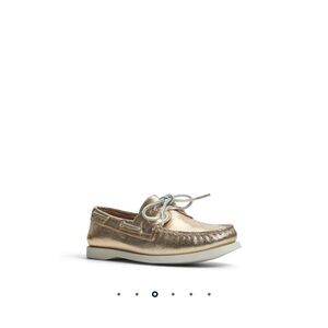 Women gold Sperry boat shoes